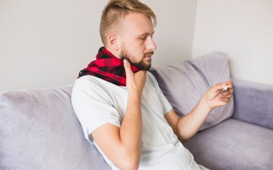 How long can a pill be stuck in your throat